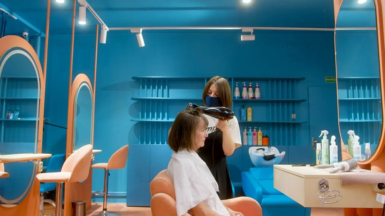 Réservation en ligne coiffeur Konfian visible sur une interface de réservation